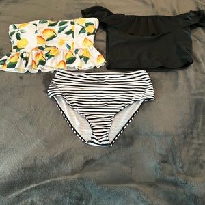 Two tankini tops and high waisted bottoms